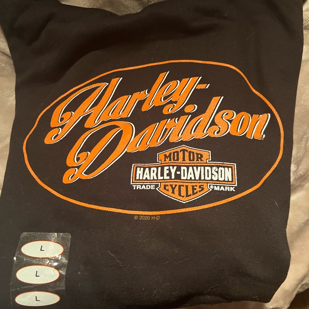 Women’s Harley Davidson black hoodie sweatshirt.  Orange logo.